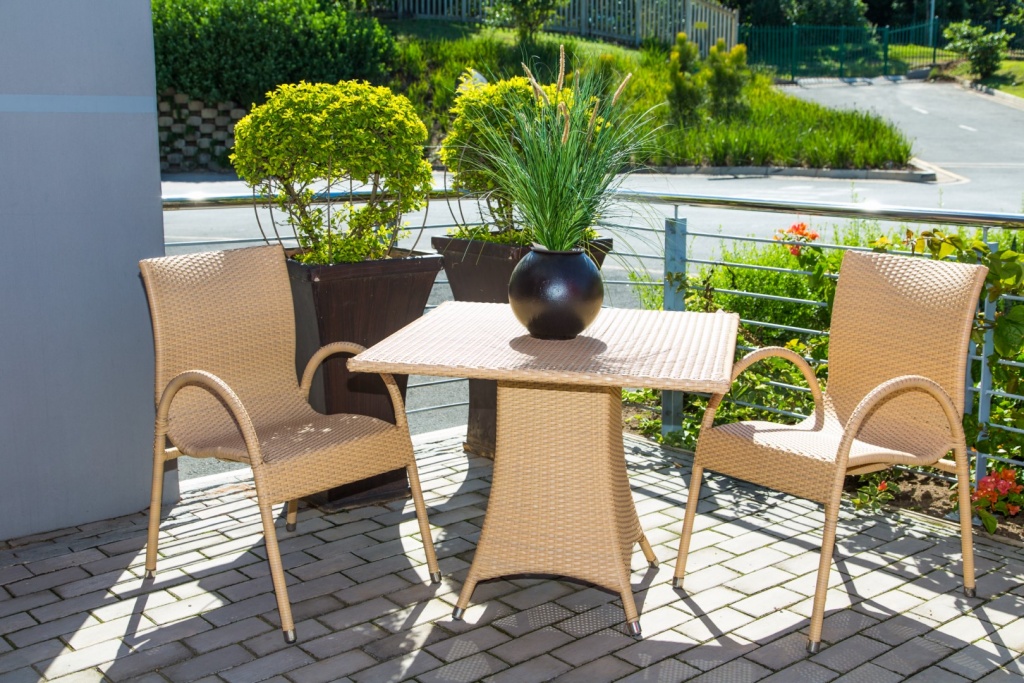 Stackable chair in honey wicker.