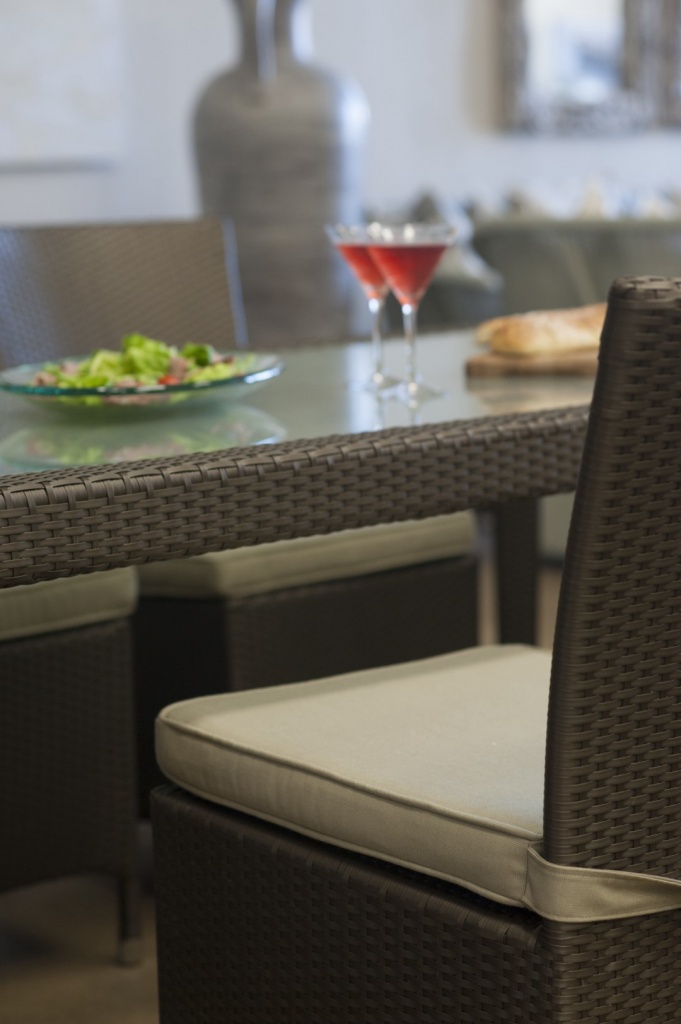 Malindi dining table with toughened glass inlay.